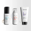 Flatlay product lineup of the Dermabay Night Skincare Routine Kit featuring the Gentle Skin Cleanser, Retinol 0.3% Serum, and Hydrating Moisturizer with texture swatches.